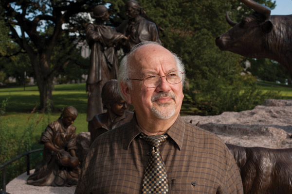 Emilio Zamora with Tejano monument in the background, which is located on the south lawn of the Texas Capitol grounds.