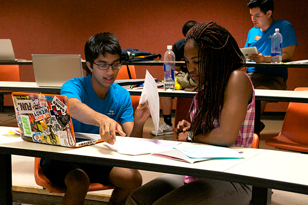 student helping at orientation