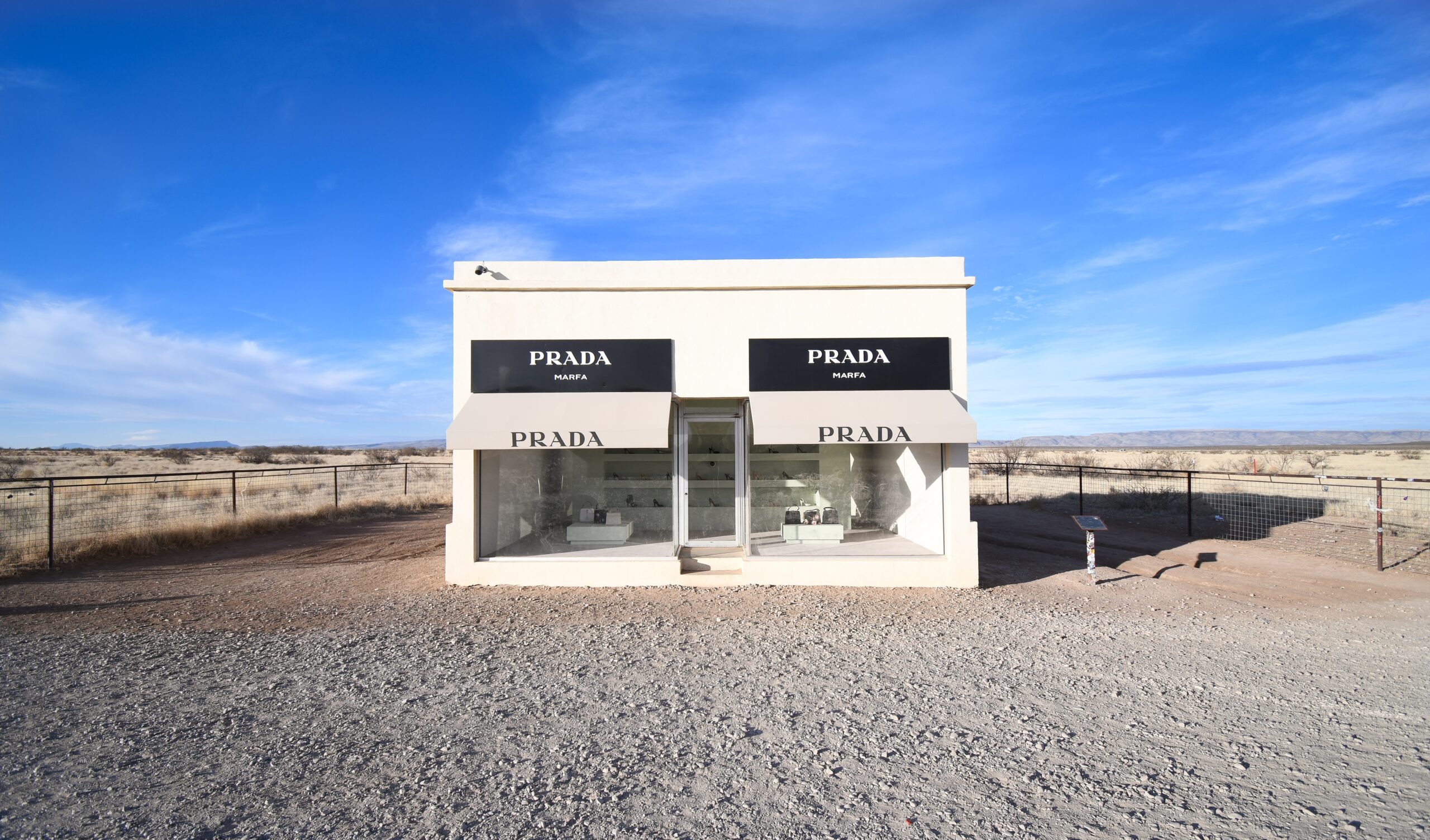 Prada Marfa installation depicting realistic boutique in the middle of West Texas described within Randy Lewis short documentary of the same name
